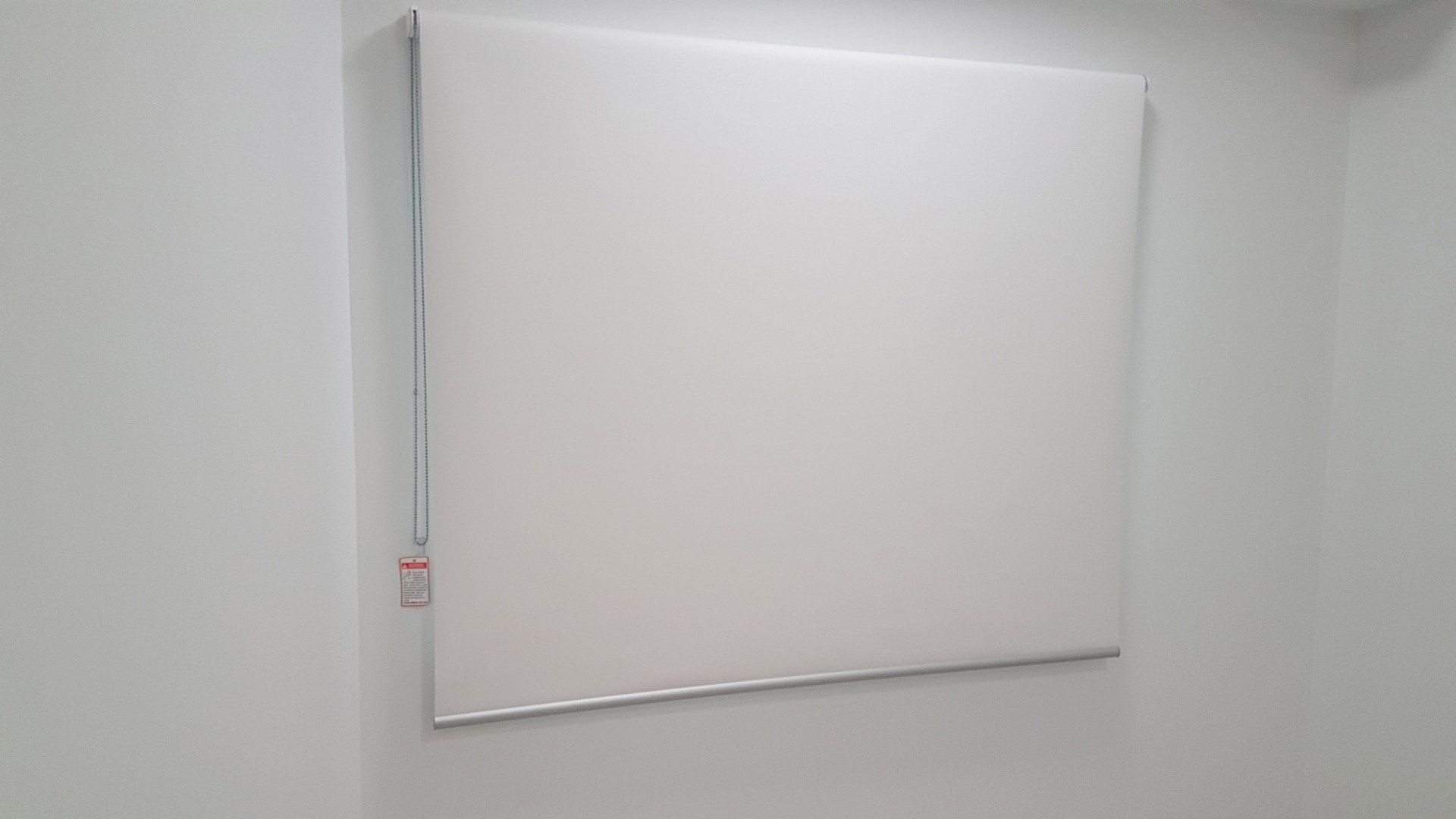 White Rolled Down Blinds — Blinds Installation in Winnellie, NT