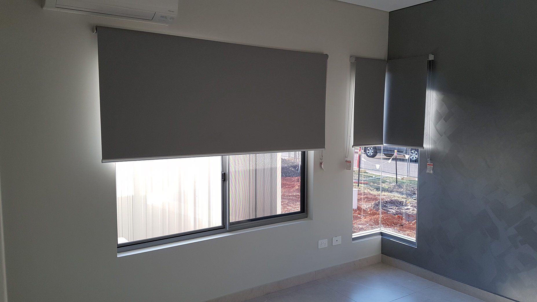 Sliding Windows Near Corner Glass Wall — Blinds Installation in Winnellie, NT