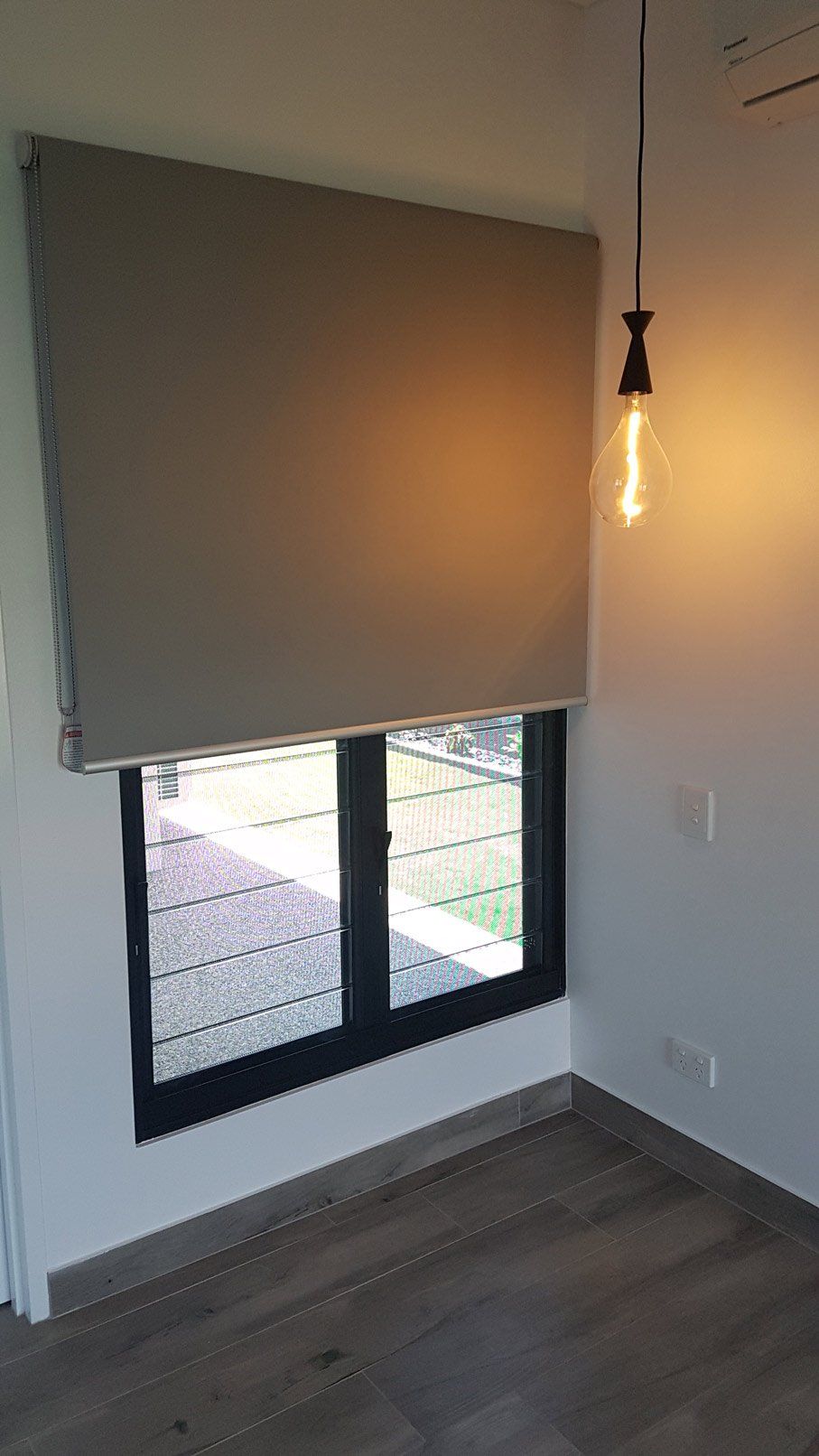 Hanging Light Near Window — Blinds Installation in Winnellie, NT
