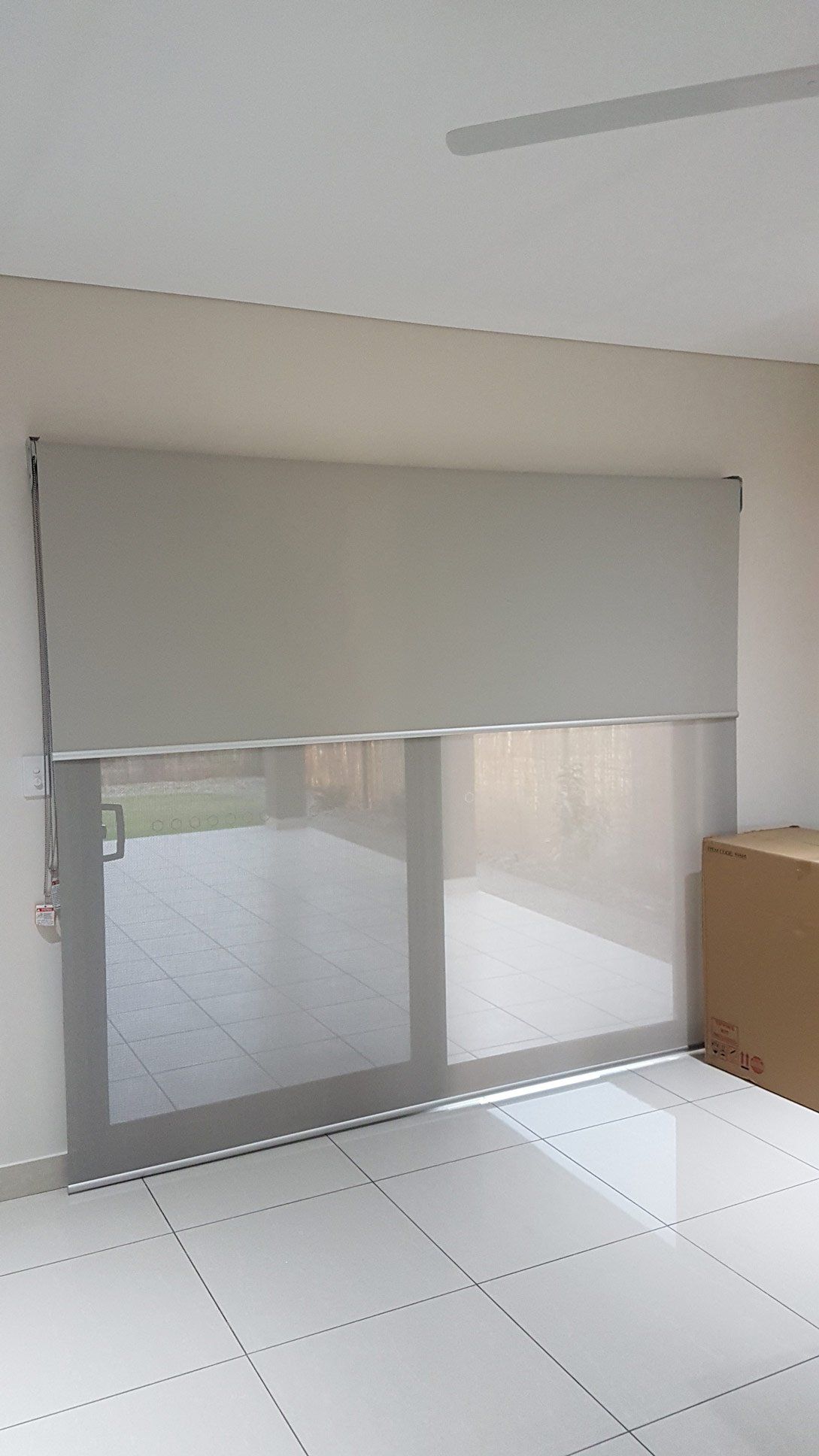 Room With Box Near Sliding Door — Blinds Installation in Winnellie, NT
