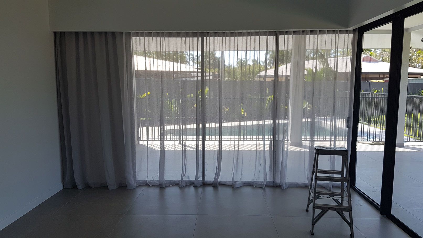 Steel Ladder Near Sliding Door — Blinds Installation in Winnellie, NT