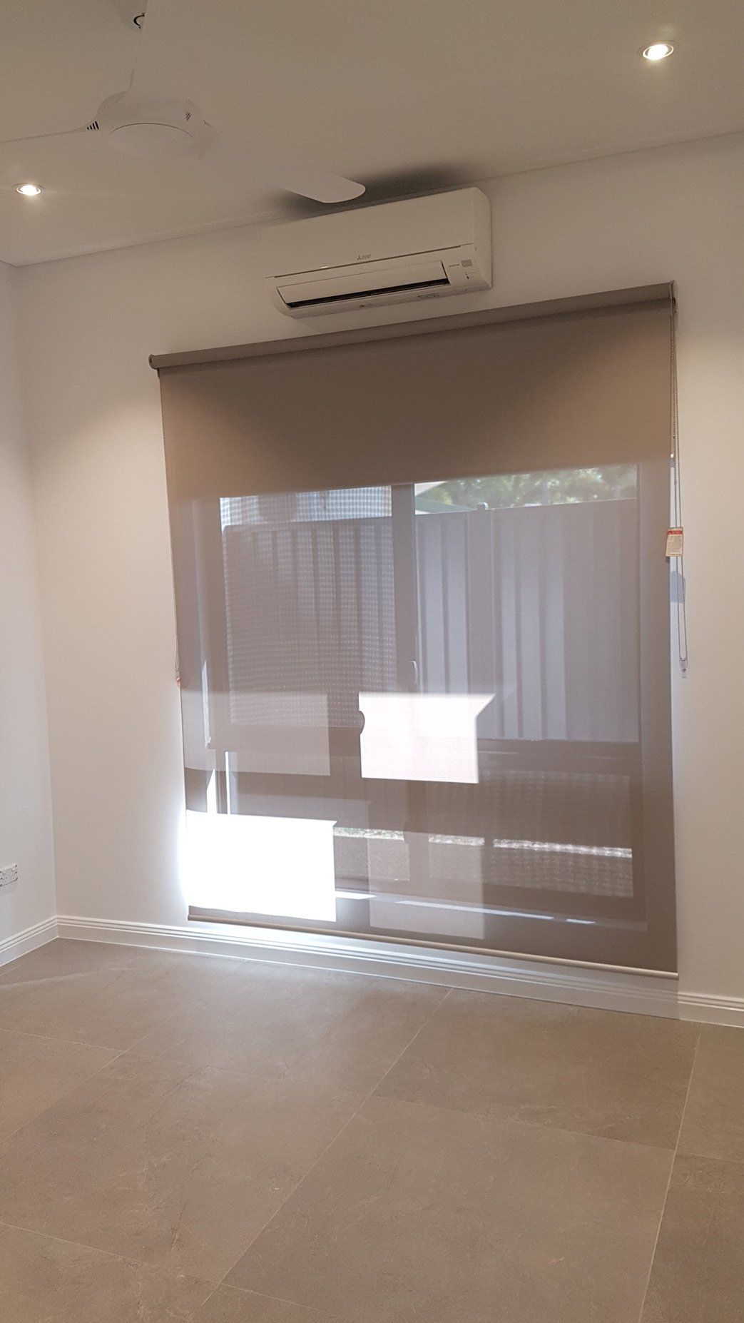 Room With Rolled Down Blinds — Blinds Installation in Winnellie, NT
