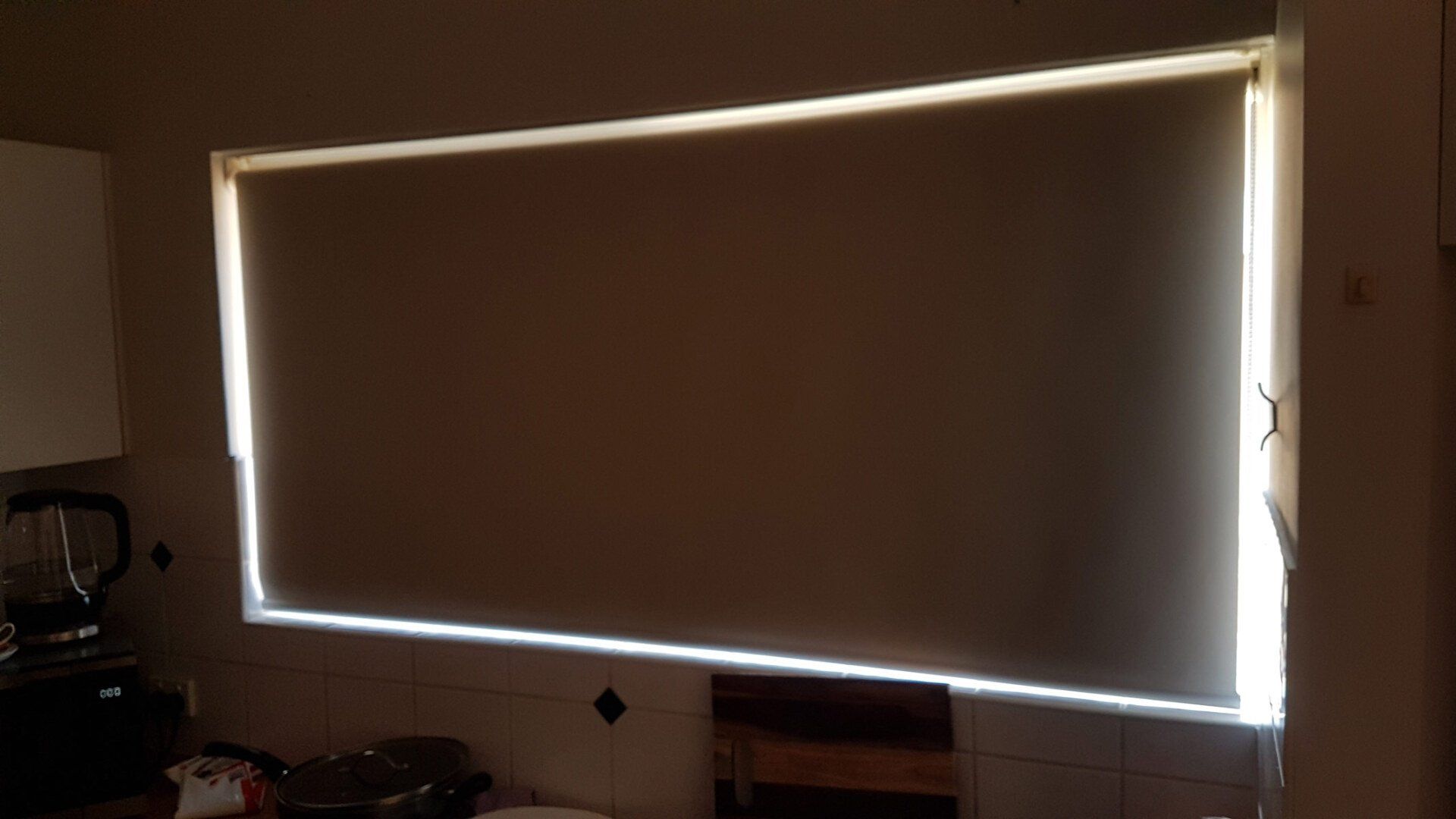 Kitchen Sunscreen Roller Blinds — Blinds Installation in Winnellie, NT