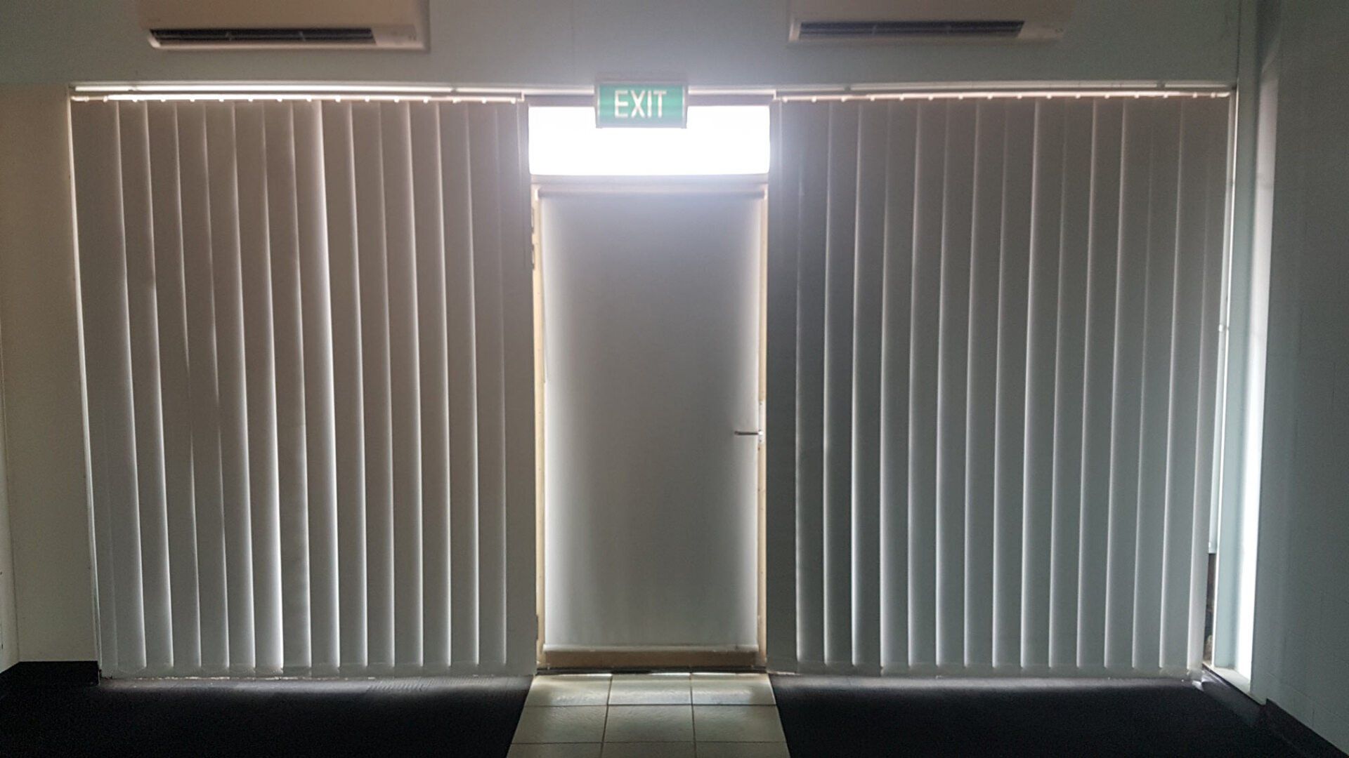 Sunscreen Vertical Blinds And Exit Door — Blinds Installation in Winnellie, NT