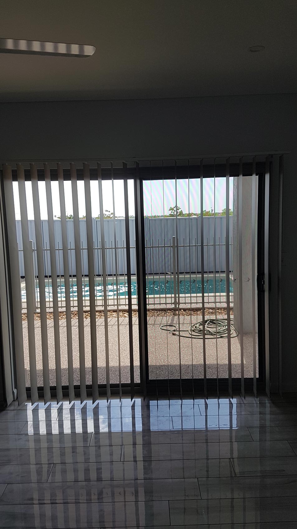 Closed Door Near Pool Area — Blinds Installation in Winnellie, NT