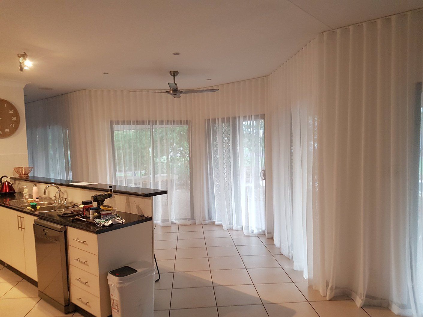 White Mesh Curtains In Kitchen Area — Blinds Installation in Winnellie, NT