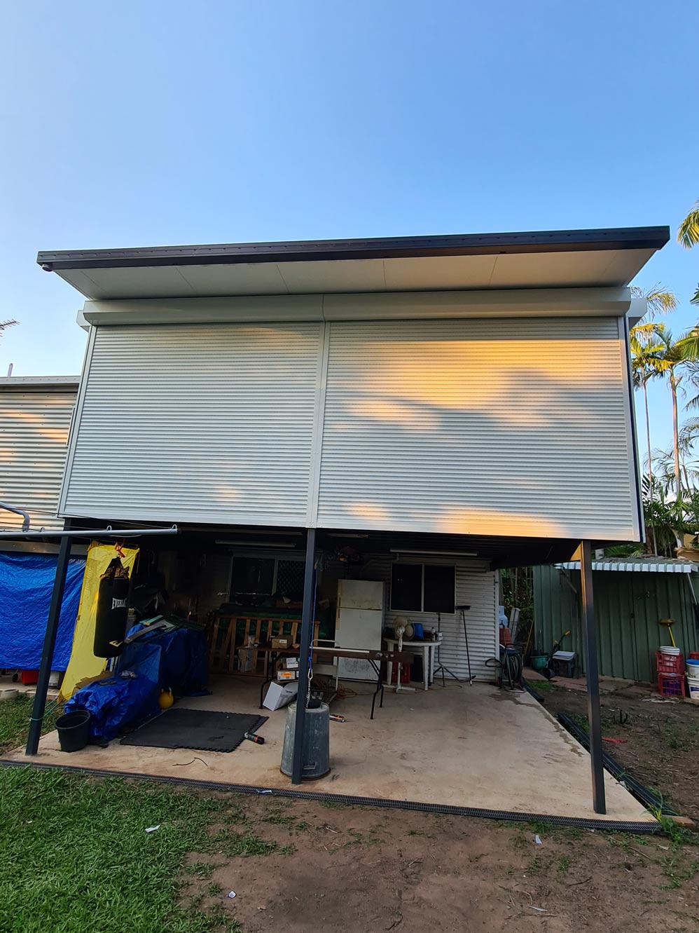 Roller Shutters On Residential House — Blinds Installation in Winnellie, NT