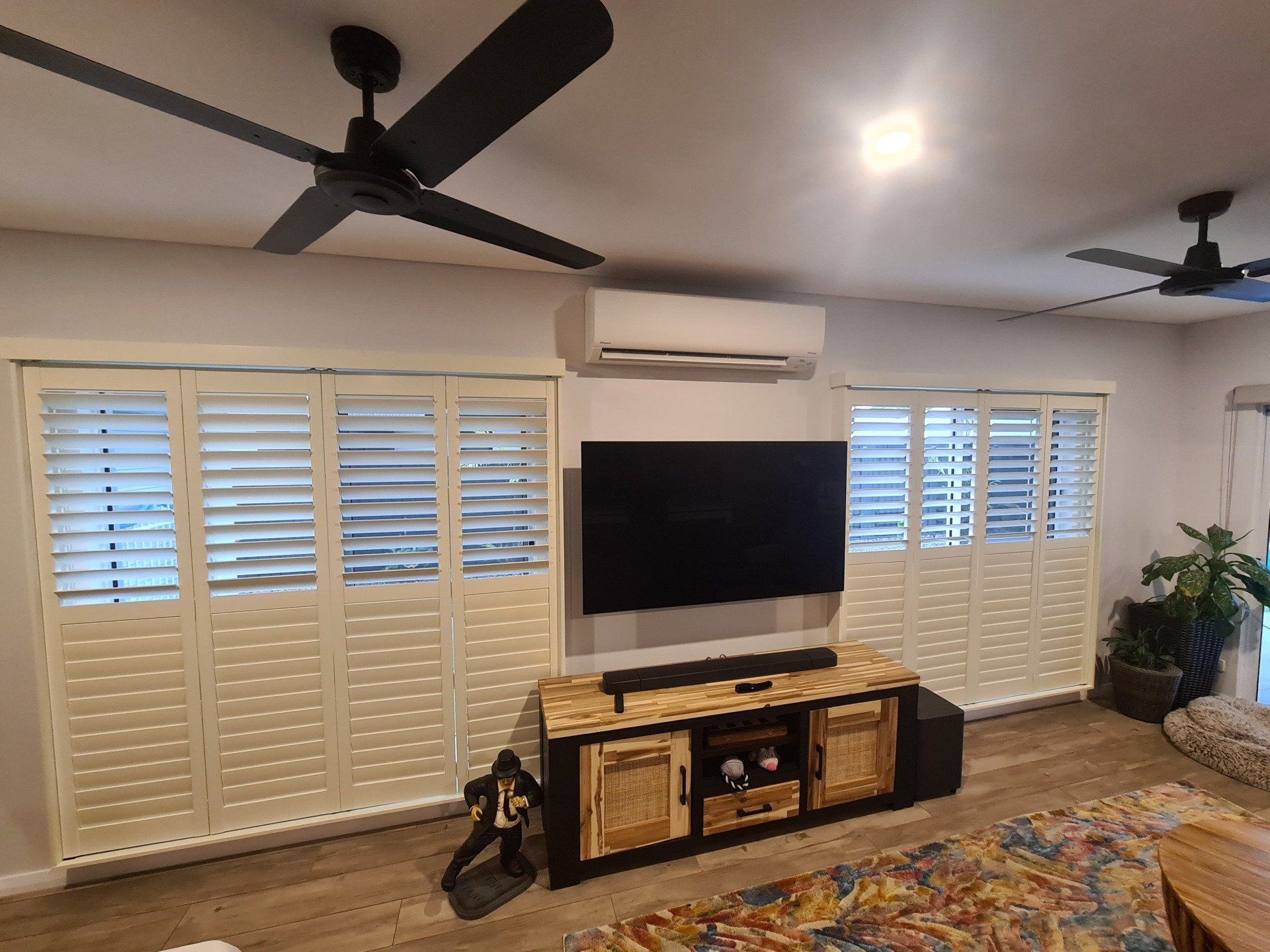 Sliding Plantation Shutters In Living Room — Blinds Installation in Winnellie, NT