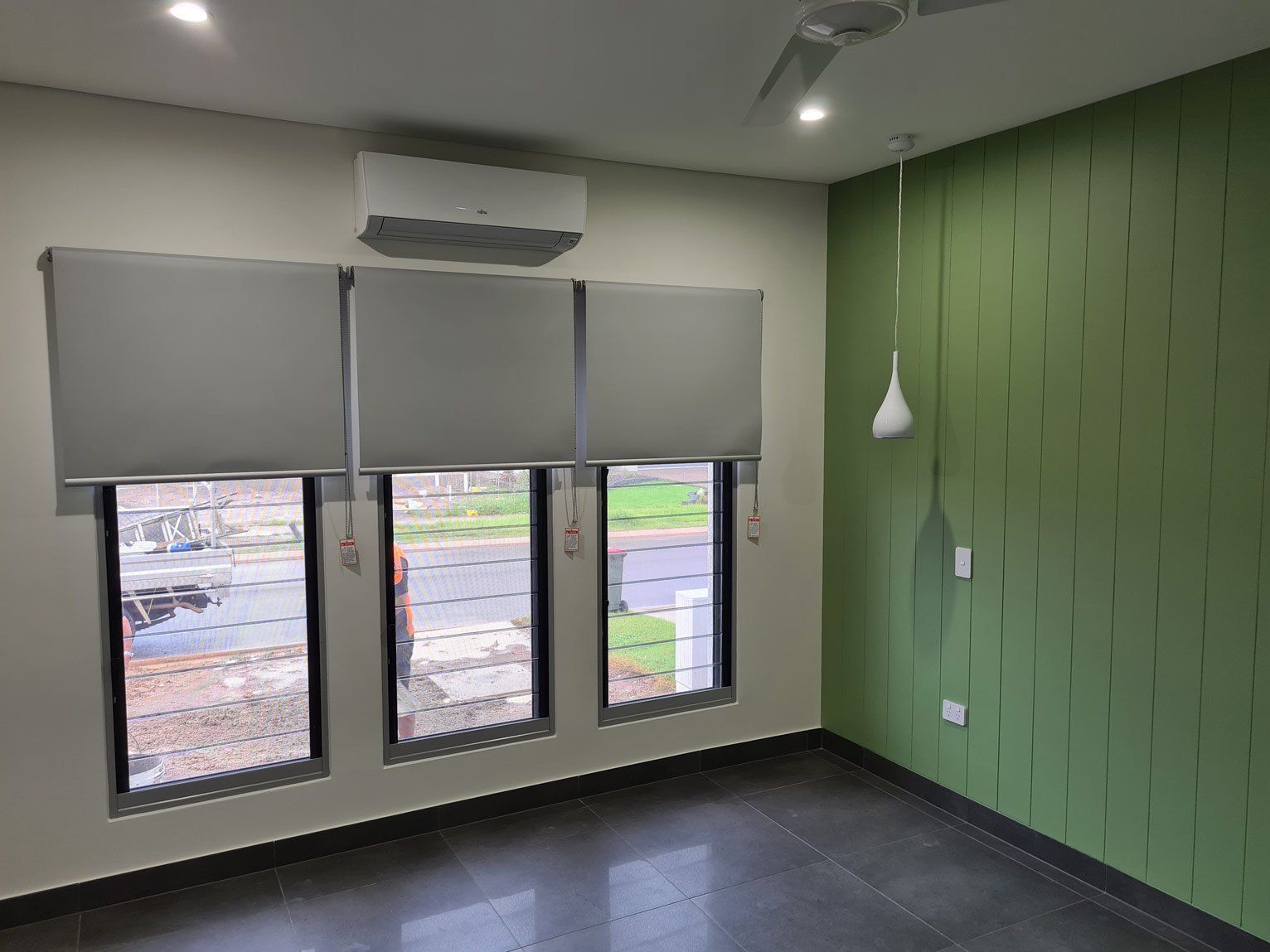 Windows And Green Wall — Blinds Installation in Winnellie, NT