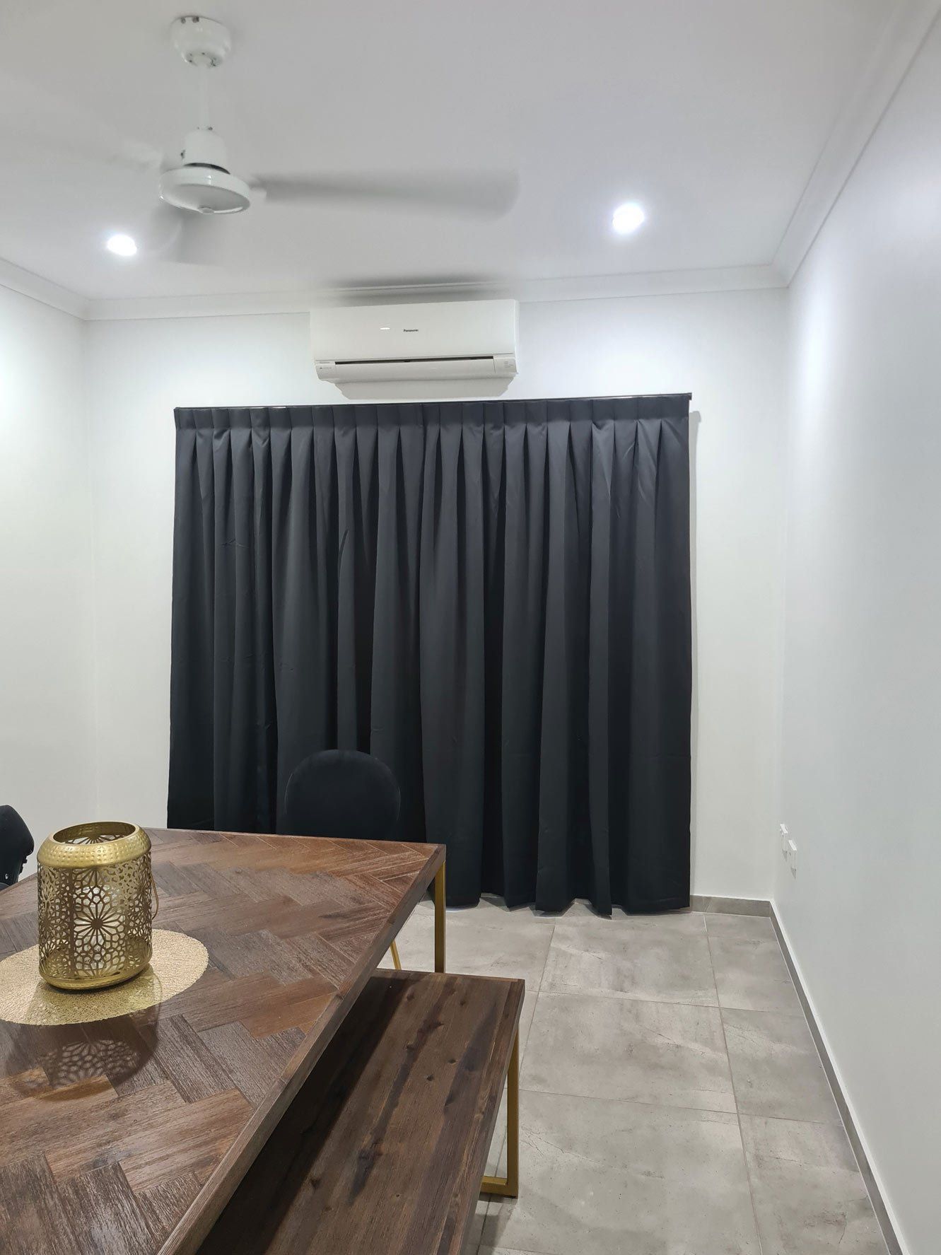 Black Panel Pair Curtains — Blinds Installation in Winnellie, NT