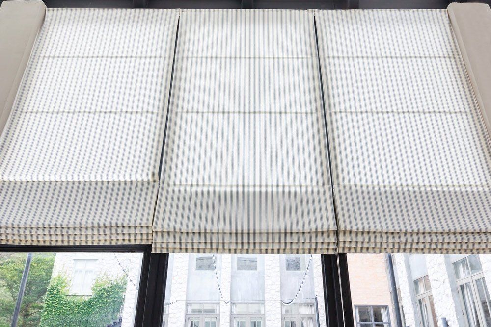 Gray And White Roman Blinds — Blinds Installation in Winnellie, NT