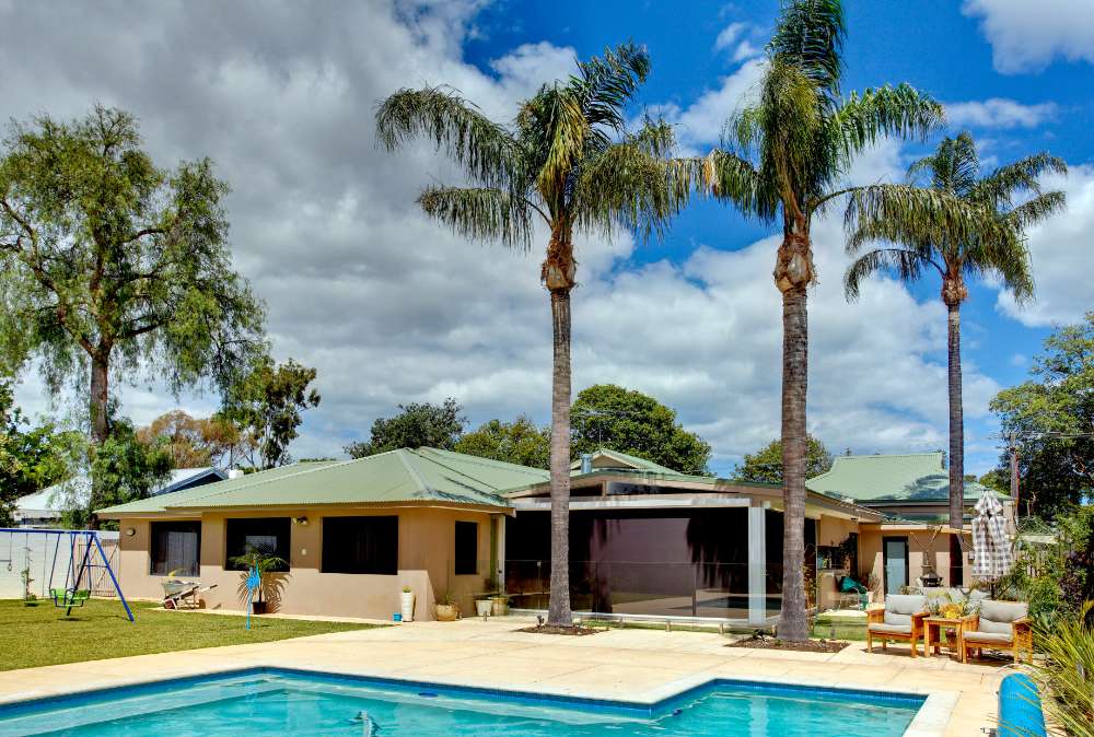 Resort with Coconut Trees — Zipscreen in Winnellie, NT