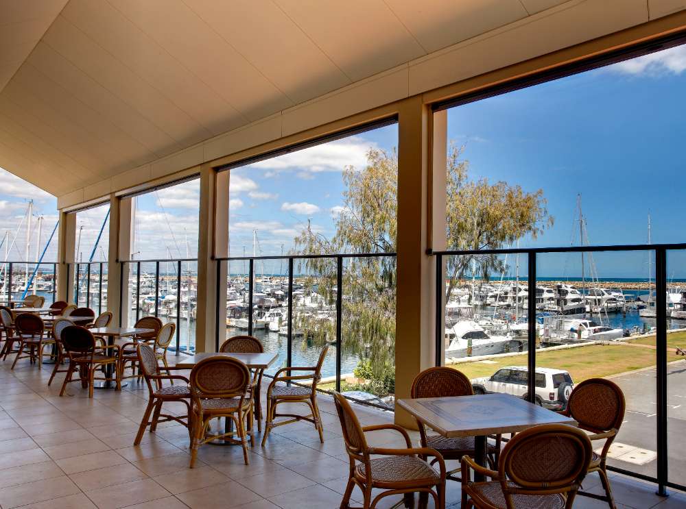 Table with View of Port Zipscreen Blinds — Zipscreen in Winnellie, NT