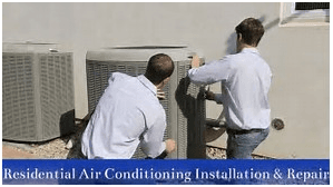 Two men installing or repairing an outdoor residential air conditioning unit.