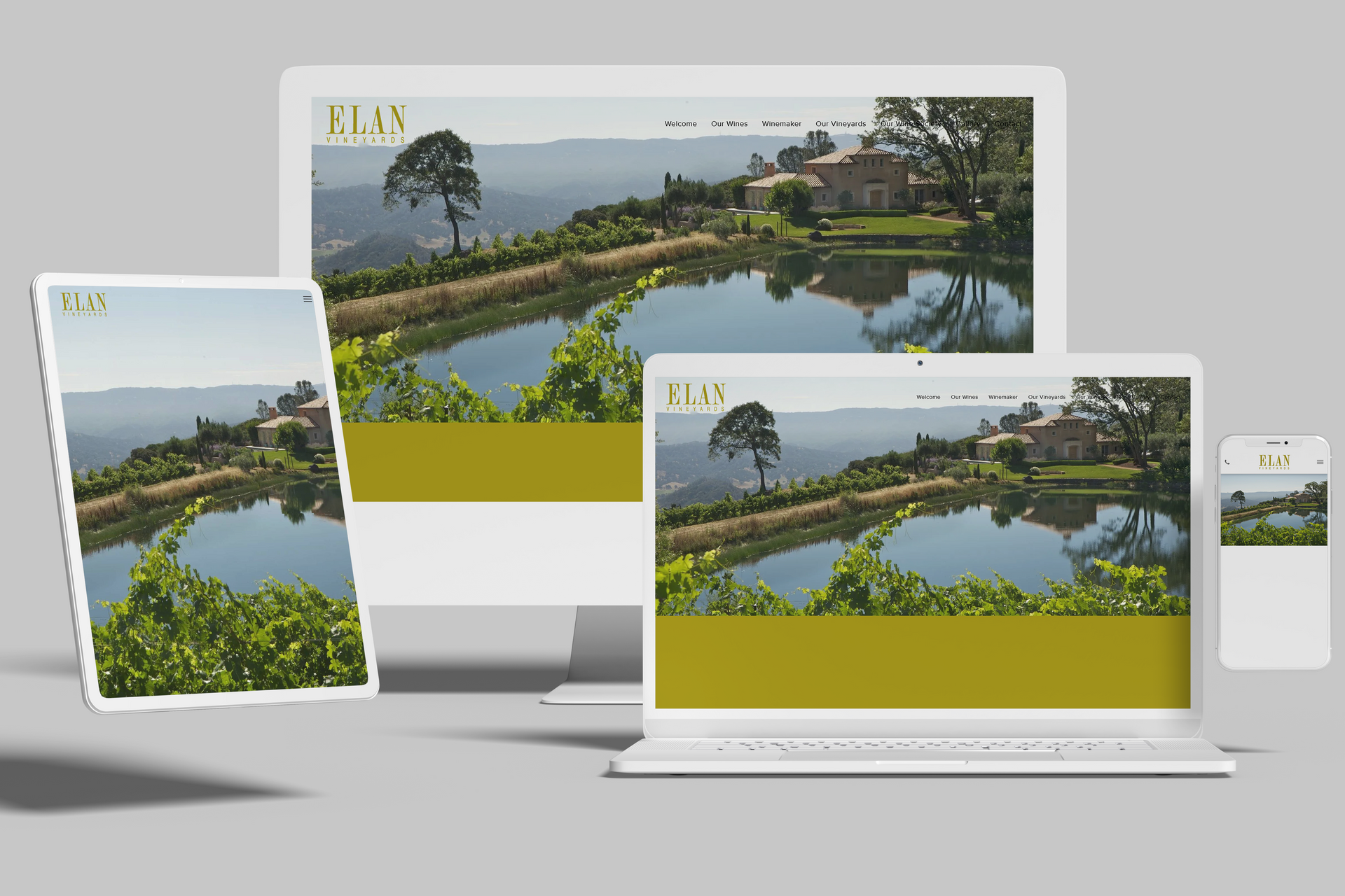 Website on multiple devices: winery with pond and hills.