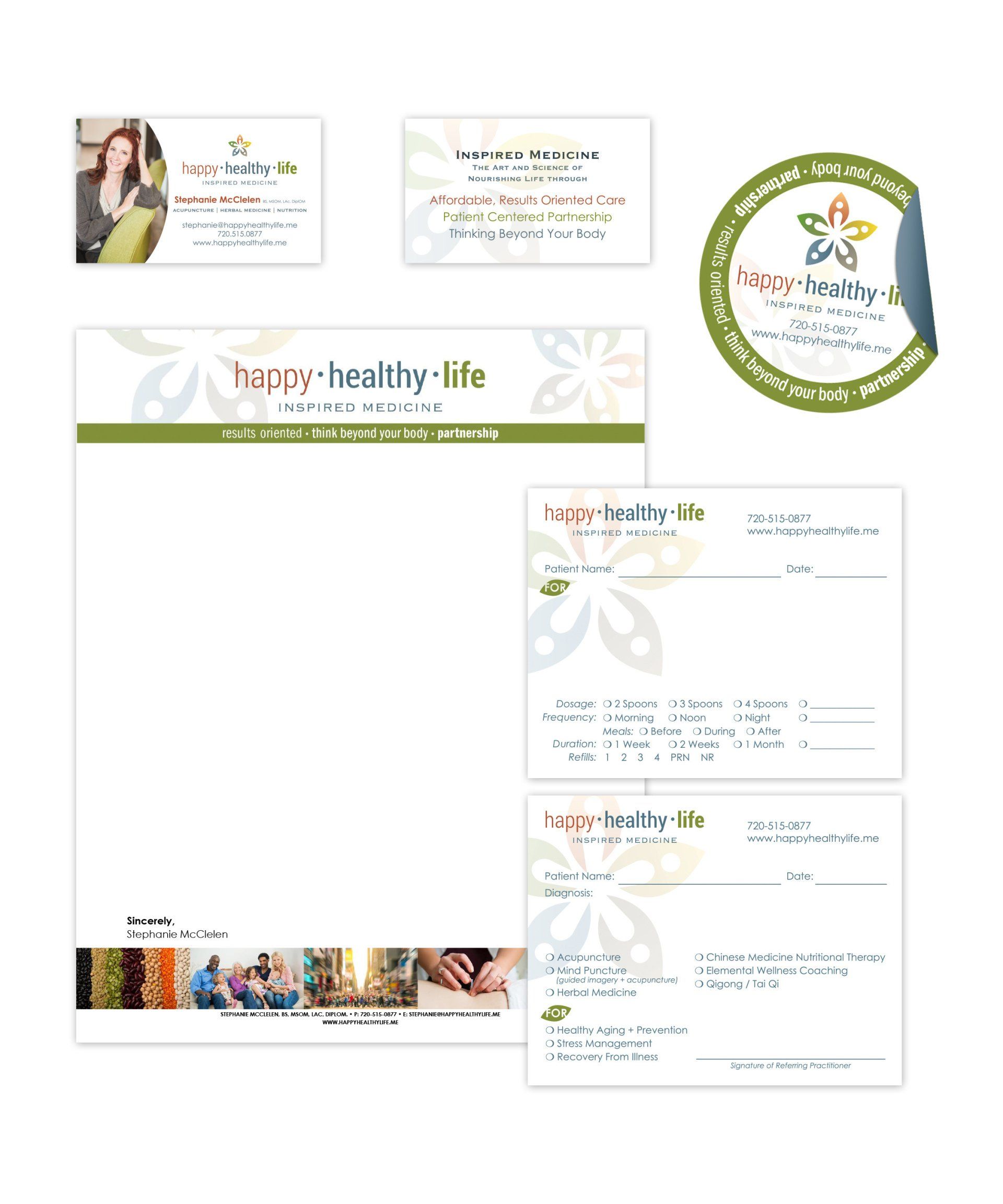 A set of business cards , envelopes , and stickers for a company called happy healthy life.