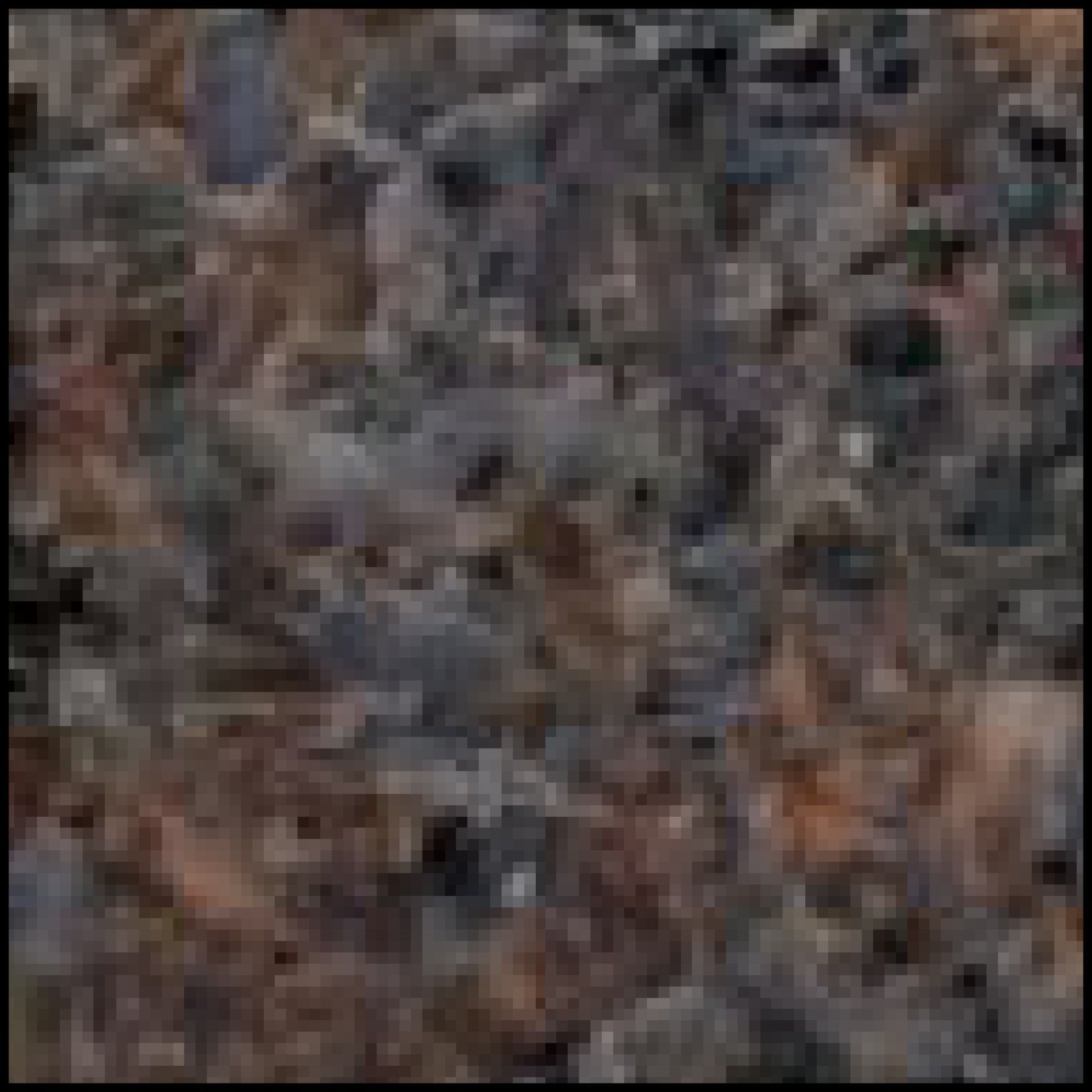 A blurry picture of a pile of leaves on the ground.