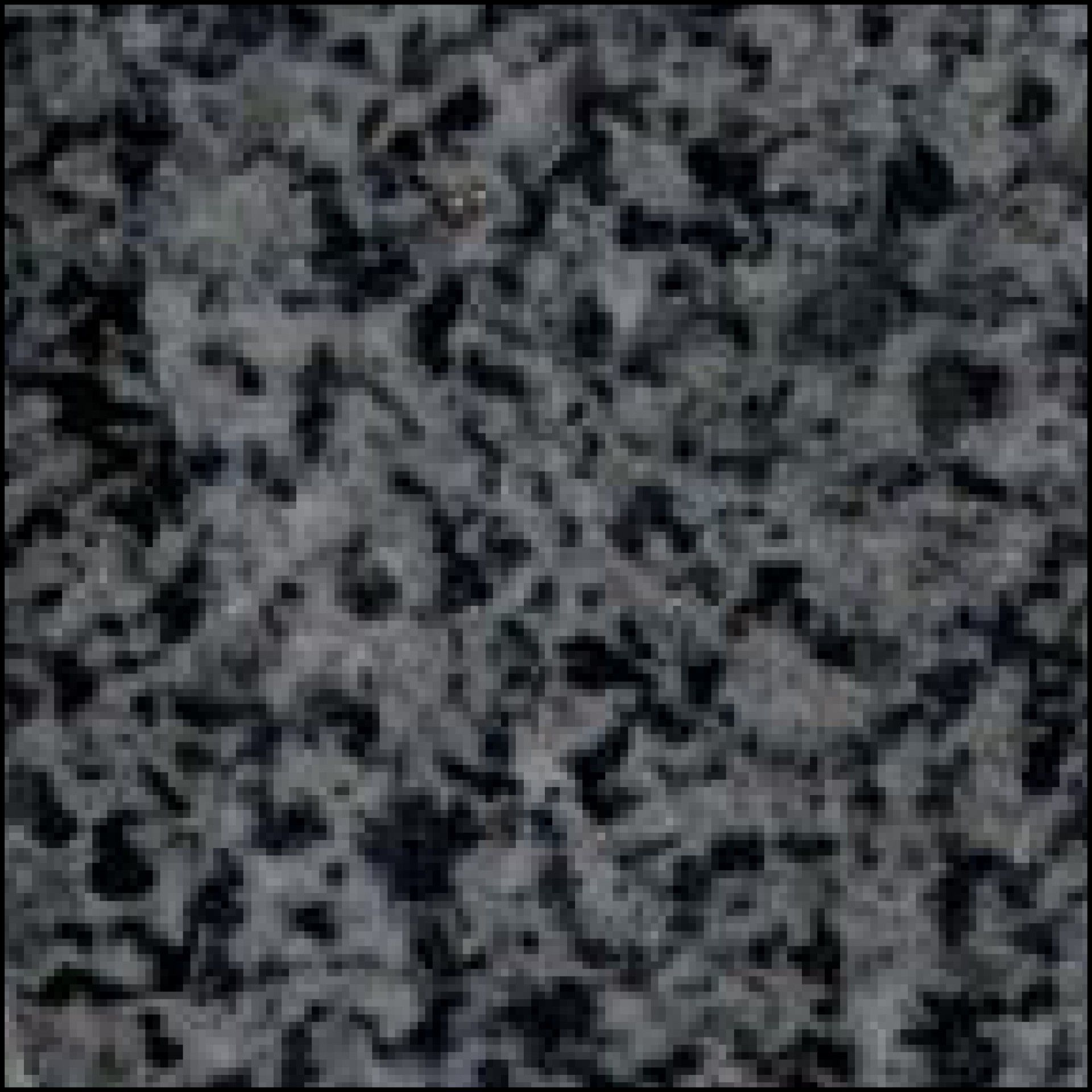 A close up of a black and white granite tile.
