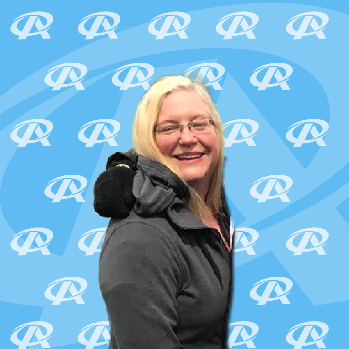 A silhouette of a woman against a blue background with the letter r on it