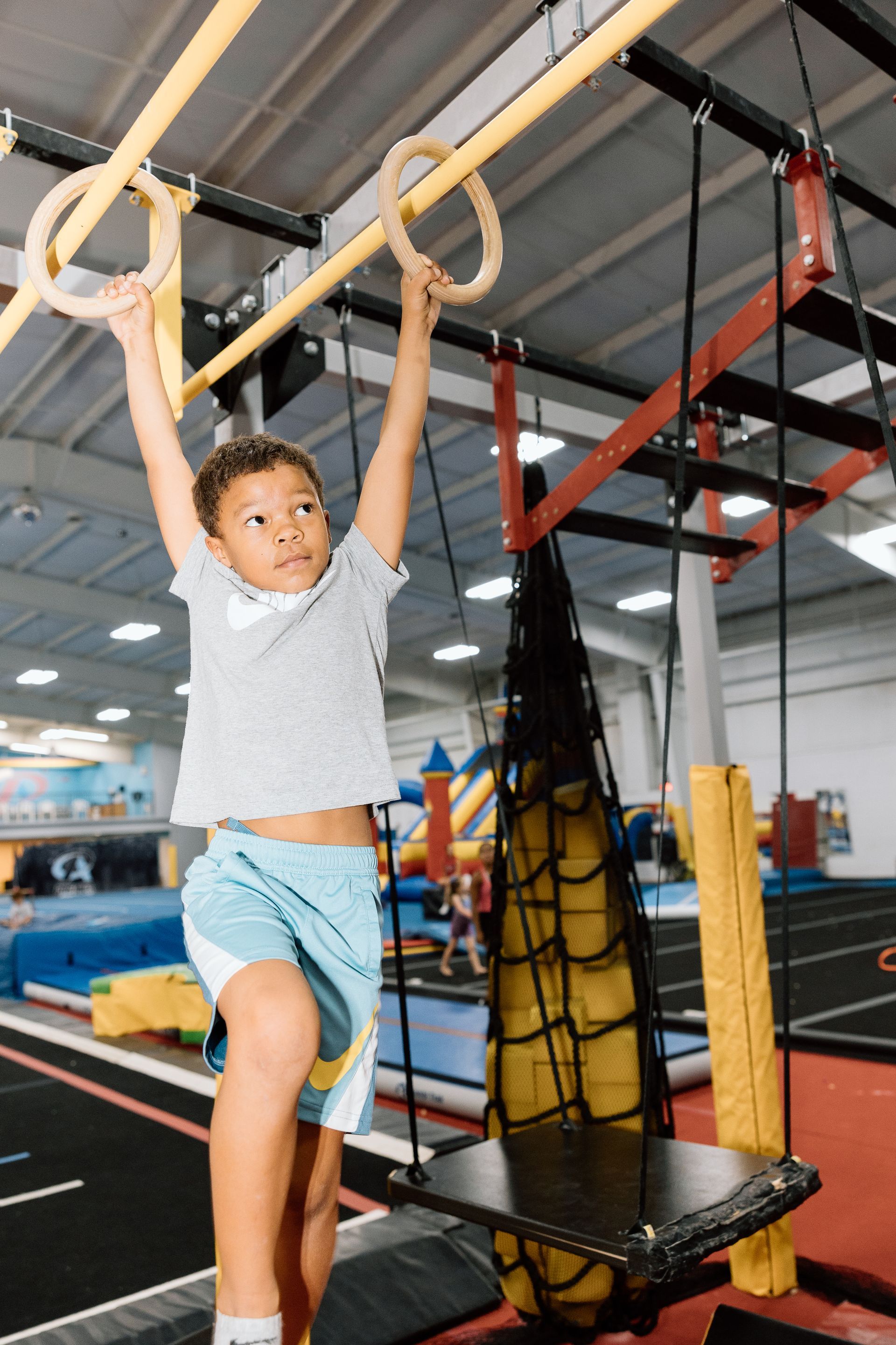 boy on gym equipment