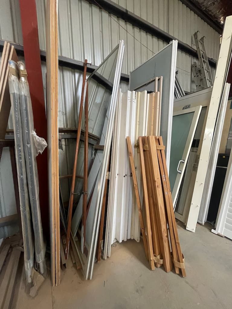 A Warehouse Filled with Lots of Pieces of Wood and Metal — Albury Demolitions in Lavington, NSW