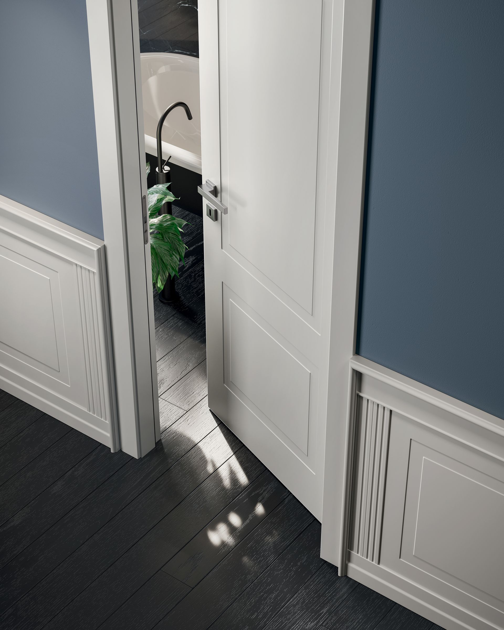 Una porta bianca socchiusa rivela un bagno con lavandino, vegetazione e luce solare su un pavimento in legno scuro.