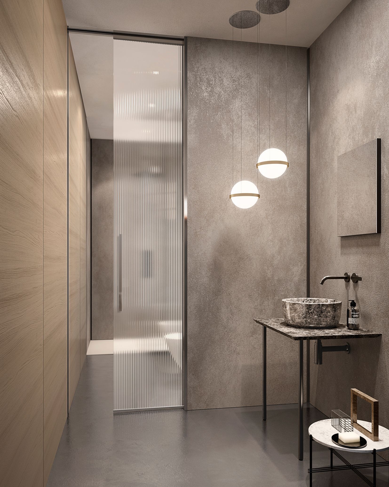 Bagno moderno con pareti in cemento, porta in vetro e arredamento minimalista.