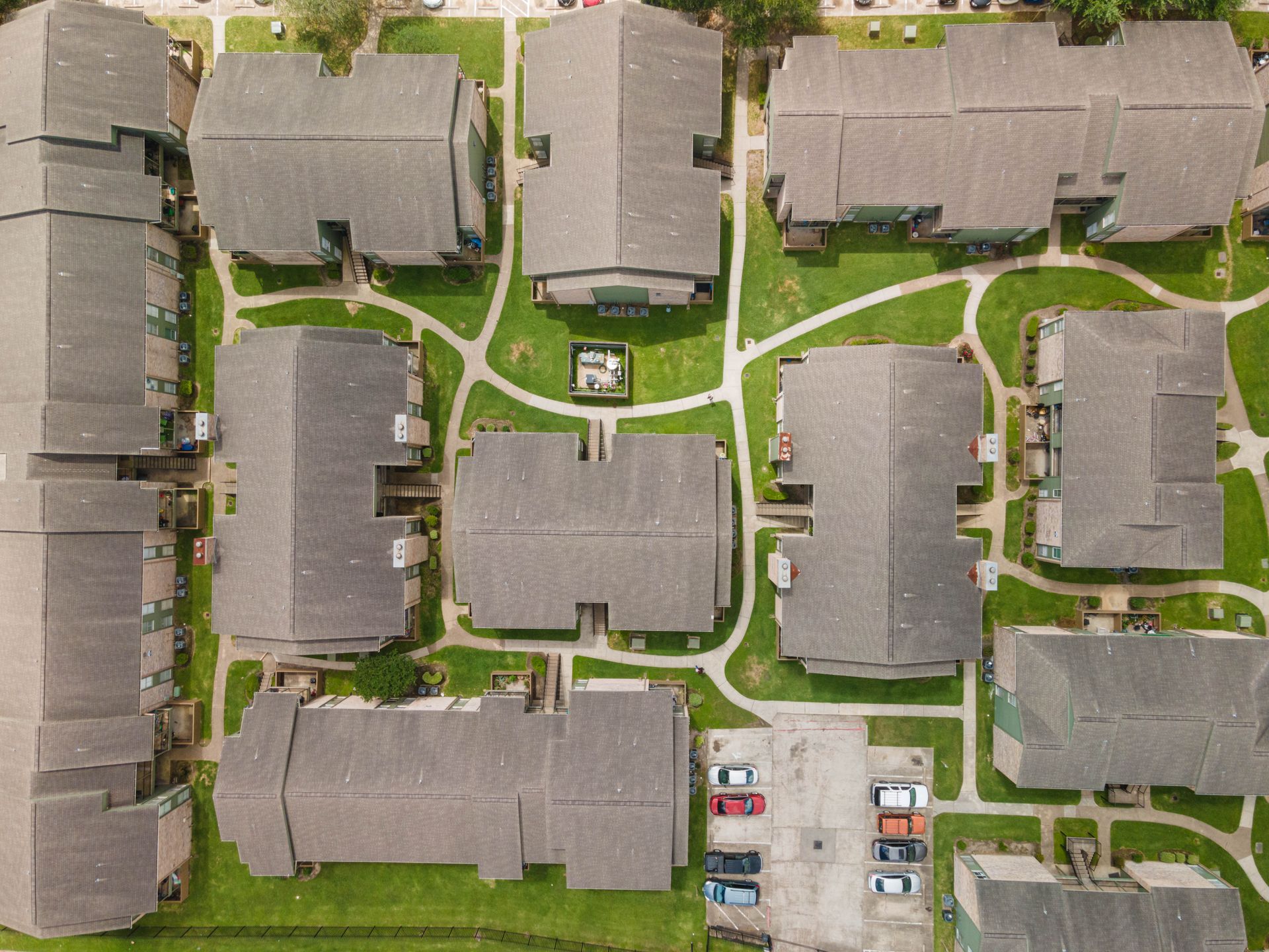 An aerial view of a residential area with lots of buildings
