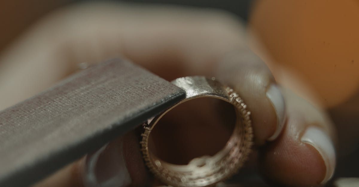 A gold ring being polished