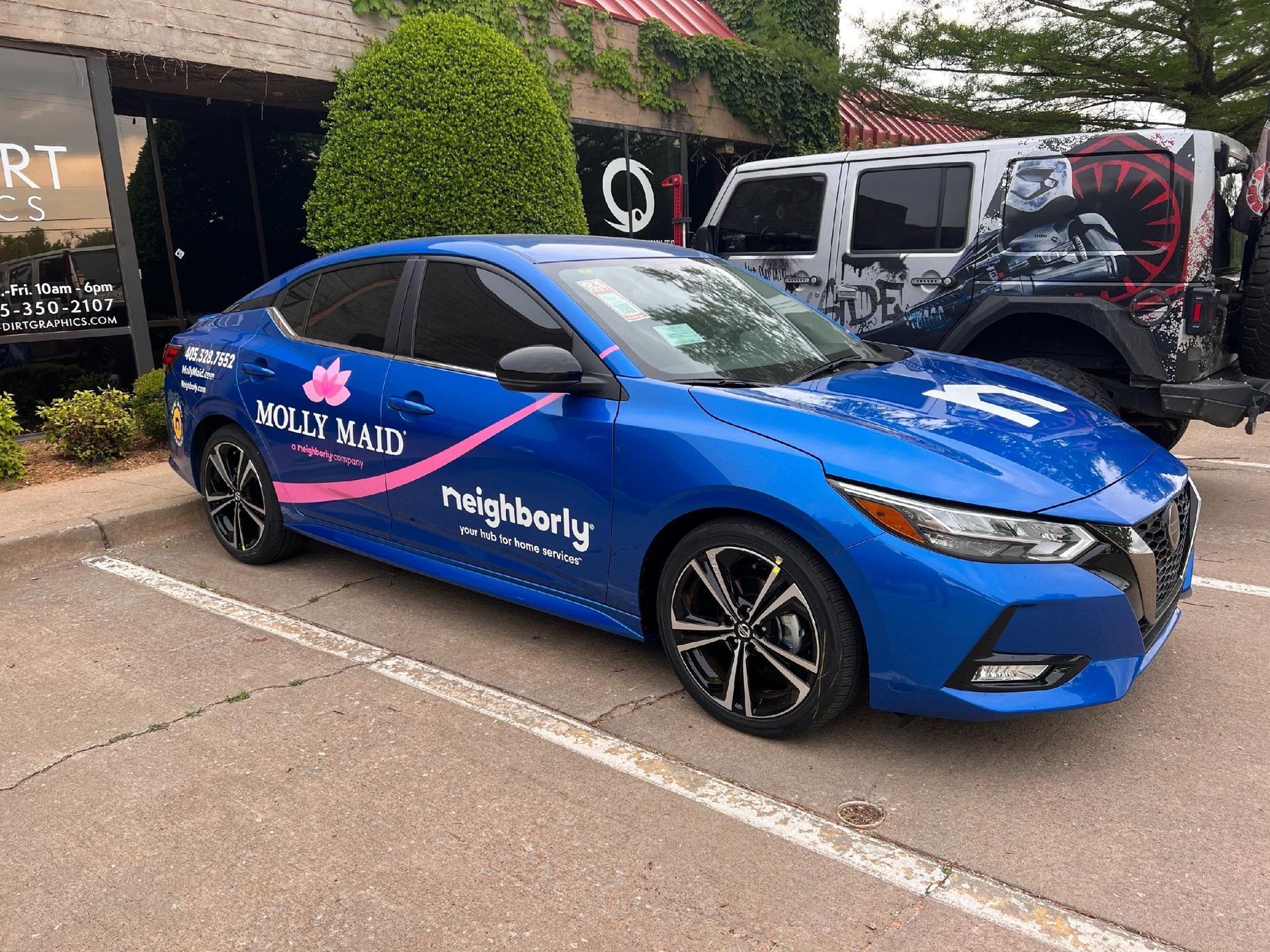 Blue Nissan sedan with 