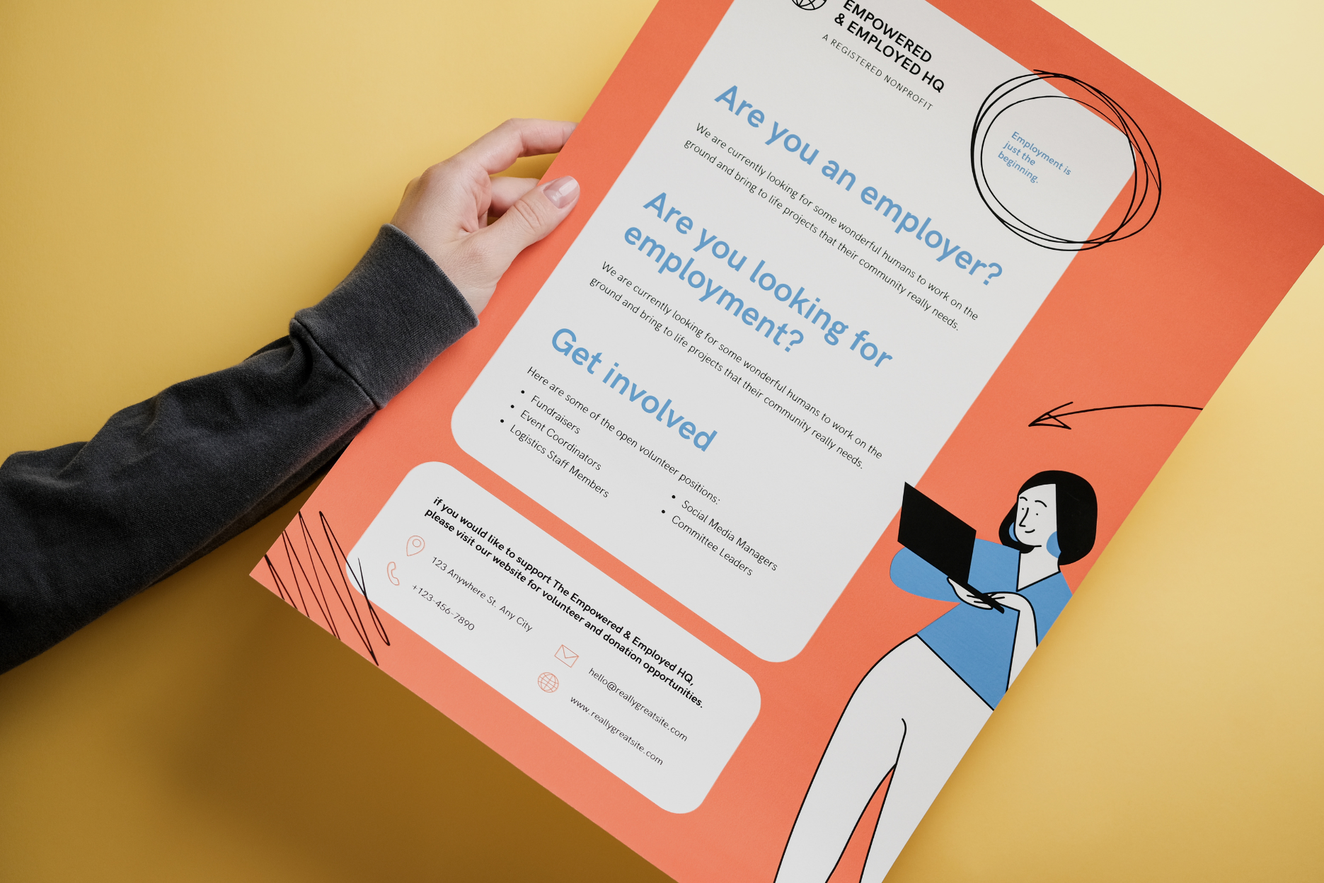 A person is holding a poster that says are you an employer