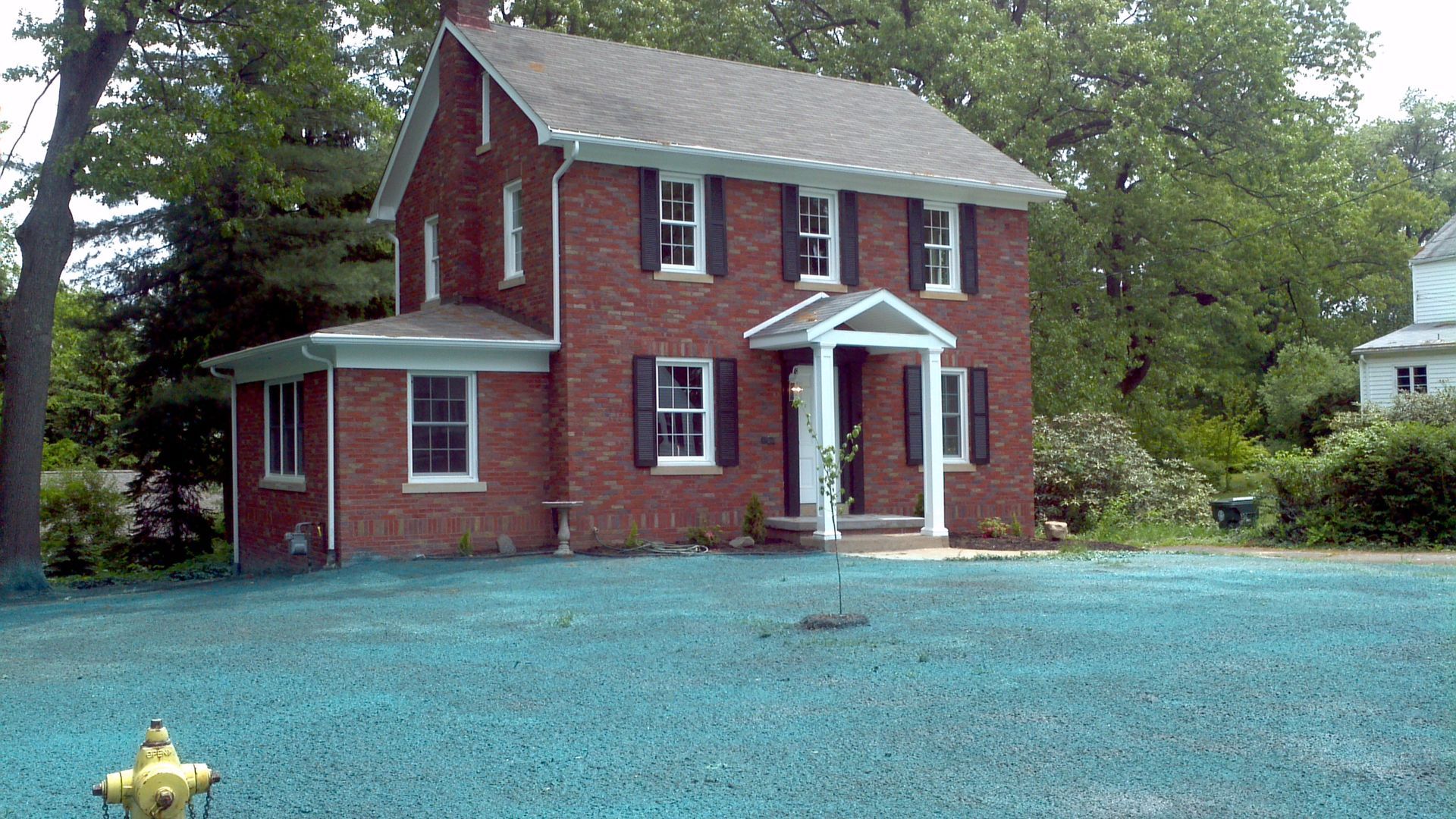 Home with newly applied hydroseed to front yard