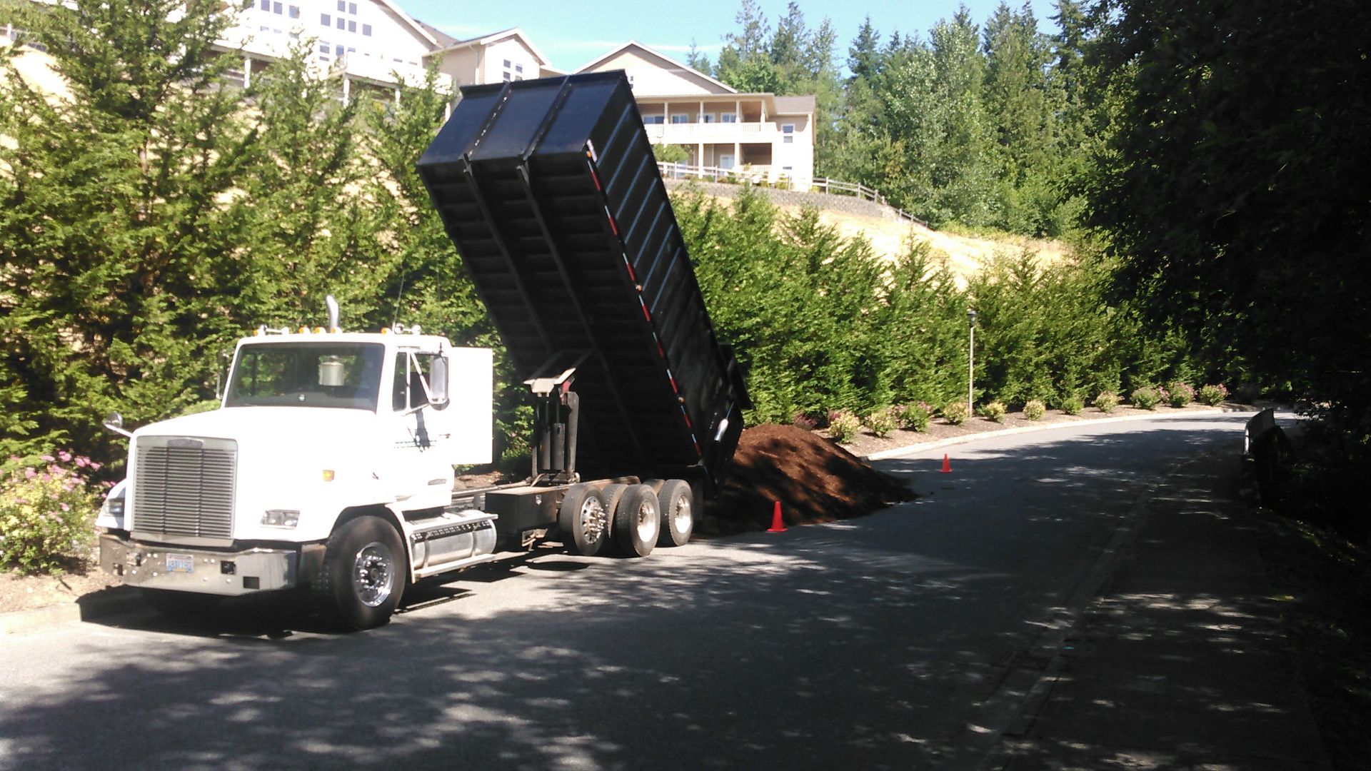 Lefeber Turf Farm truck dumping bark
