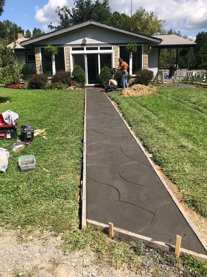 House Exterior with New Pathway — West Middlesex, PA — Z'Crete Concrete & Excavation LLC