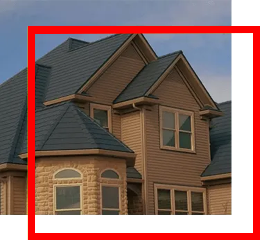 House with dark blue roof, tan siding, and arched and rectangular windows.