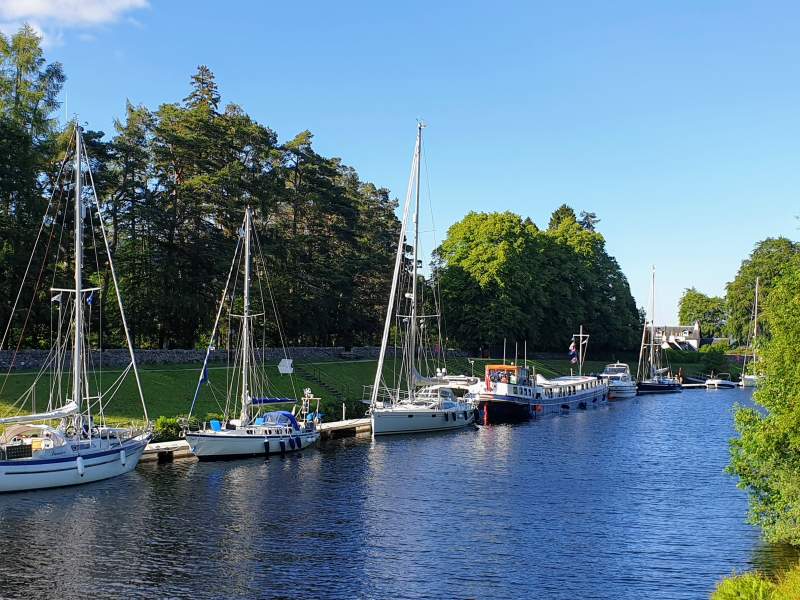 Boats moored on the Caledonian Canal Fort Augustus Highlands Scotland