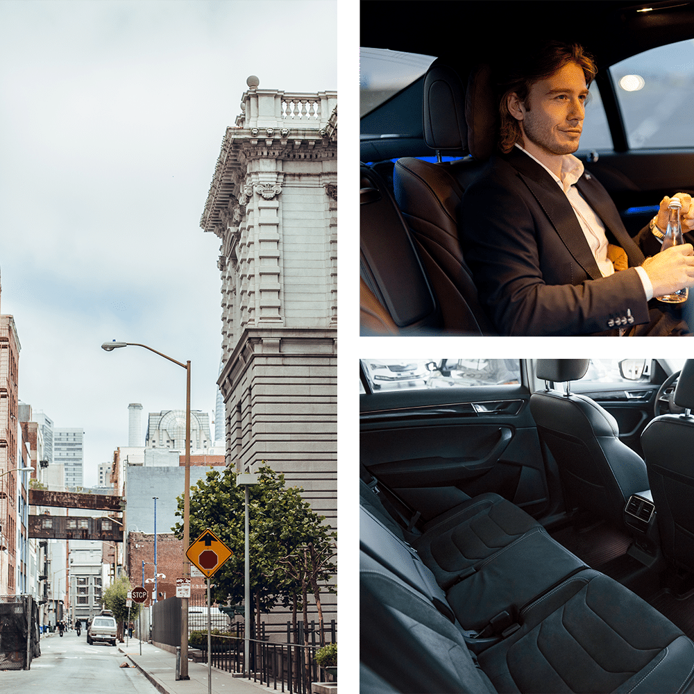 A man in a suit is sitting in the back seat of a car