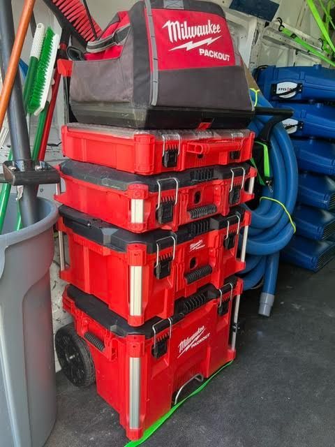 A stack of red milwaukee tool boxes