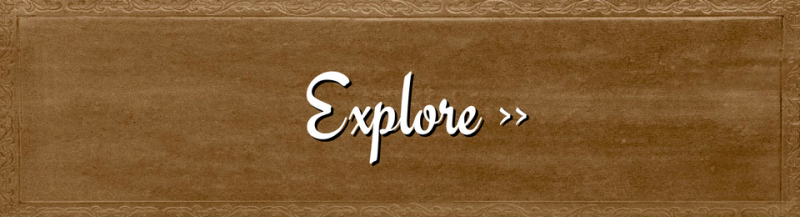 Wooden textured banner with white script text reading “Explore >>”