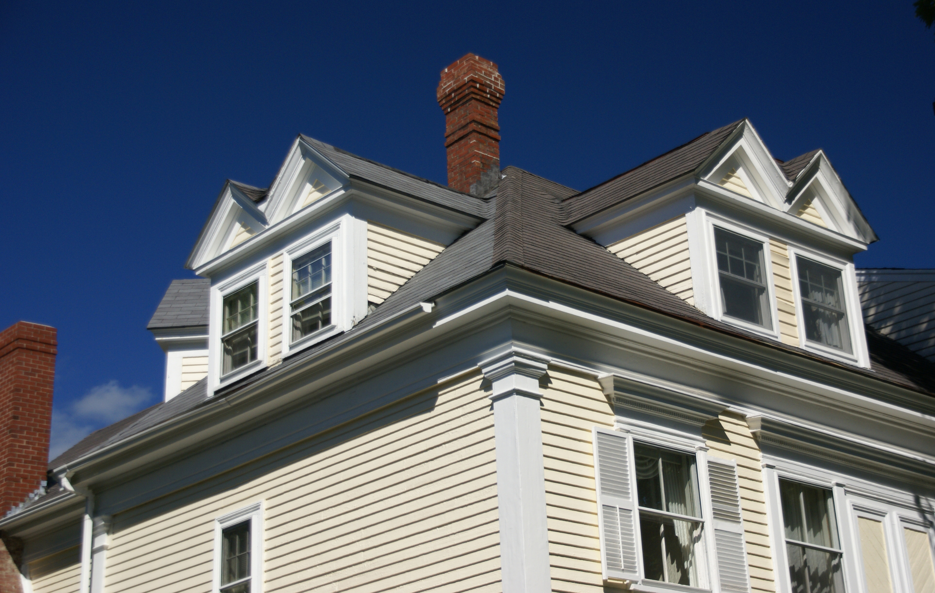A house with a chimney on top of it