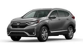 SUV Honda CR-V cinza sobre fundo branco, exibindo seu design exterior.