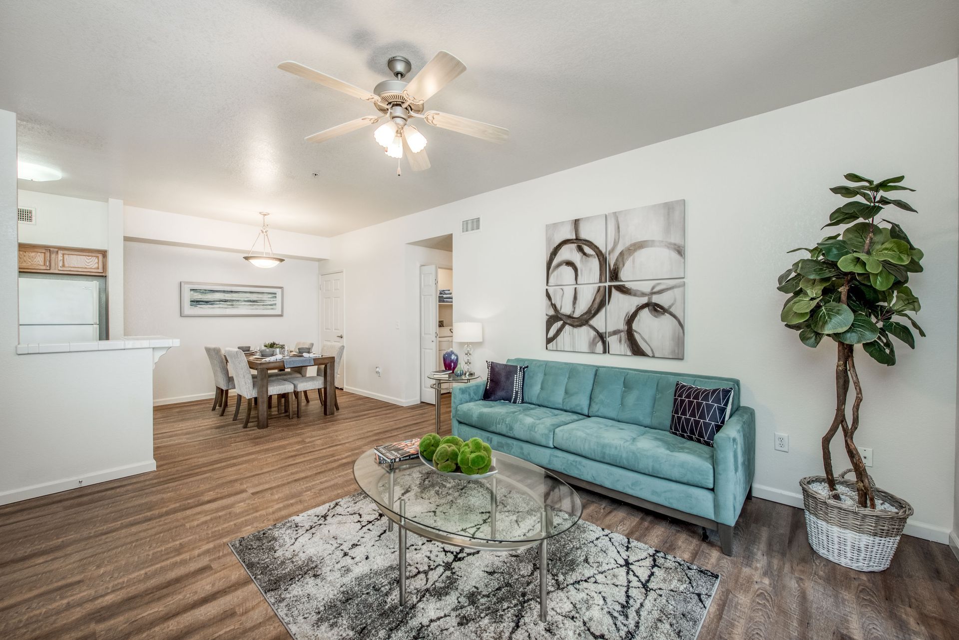 a living room with a pool table and a couch