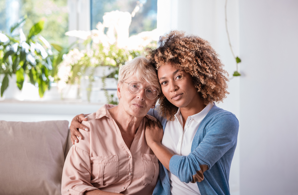 Caregiver helping a loved one with dementia remain comfortable and independent at home