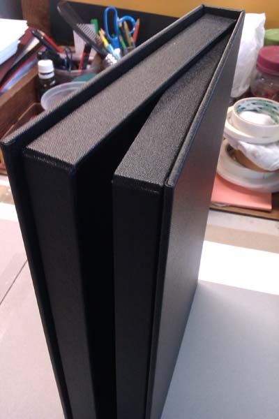 mostly closed black cover