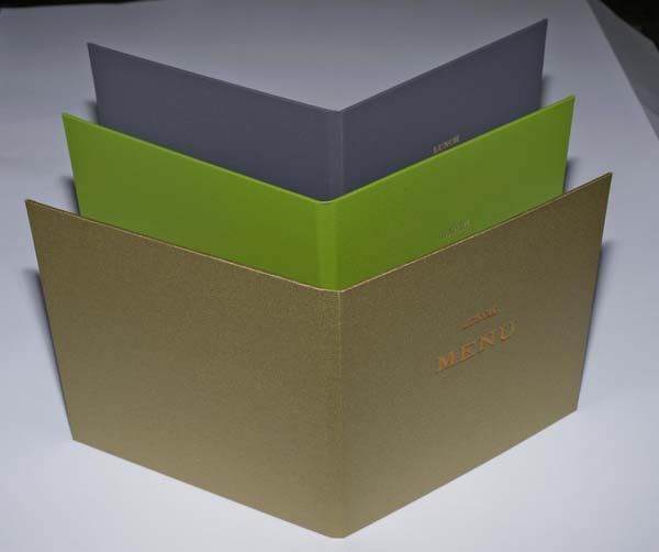 blue, green and gold menu covers