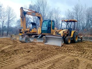 Digger excavating - Septic tank cleaning Residential in Ballston Lake, NY