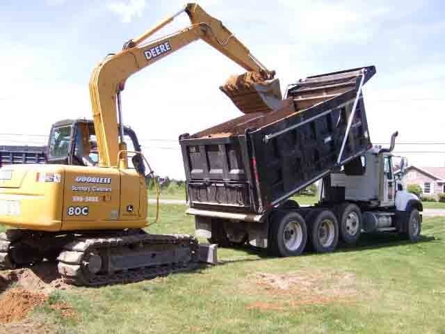 Excavator with truck - Septic Tank Cleaning Residential