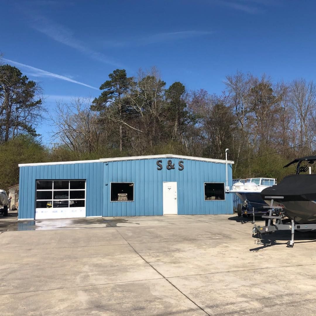 A blue building with the word s & s on it