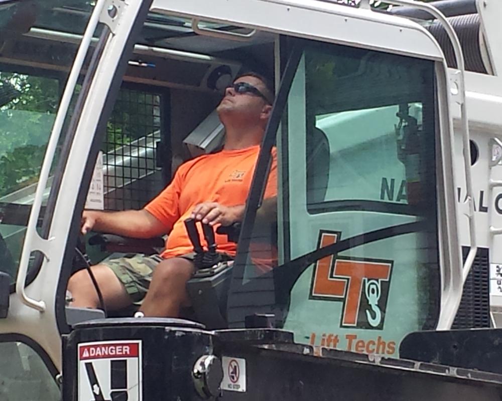 Worker Inside the Truck — Chalfont, PA — Lift Tech Crane and Rigging