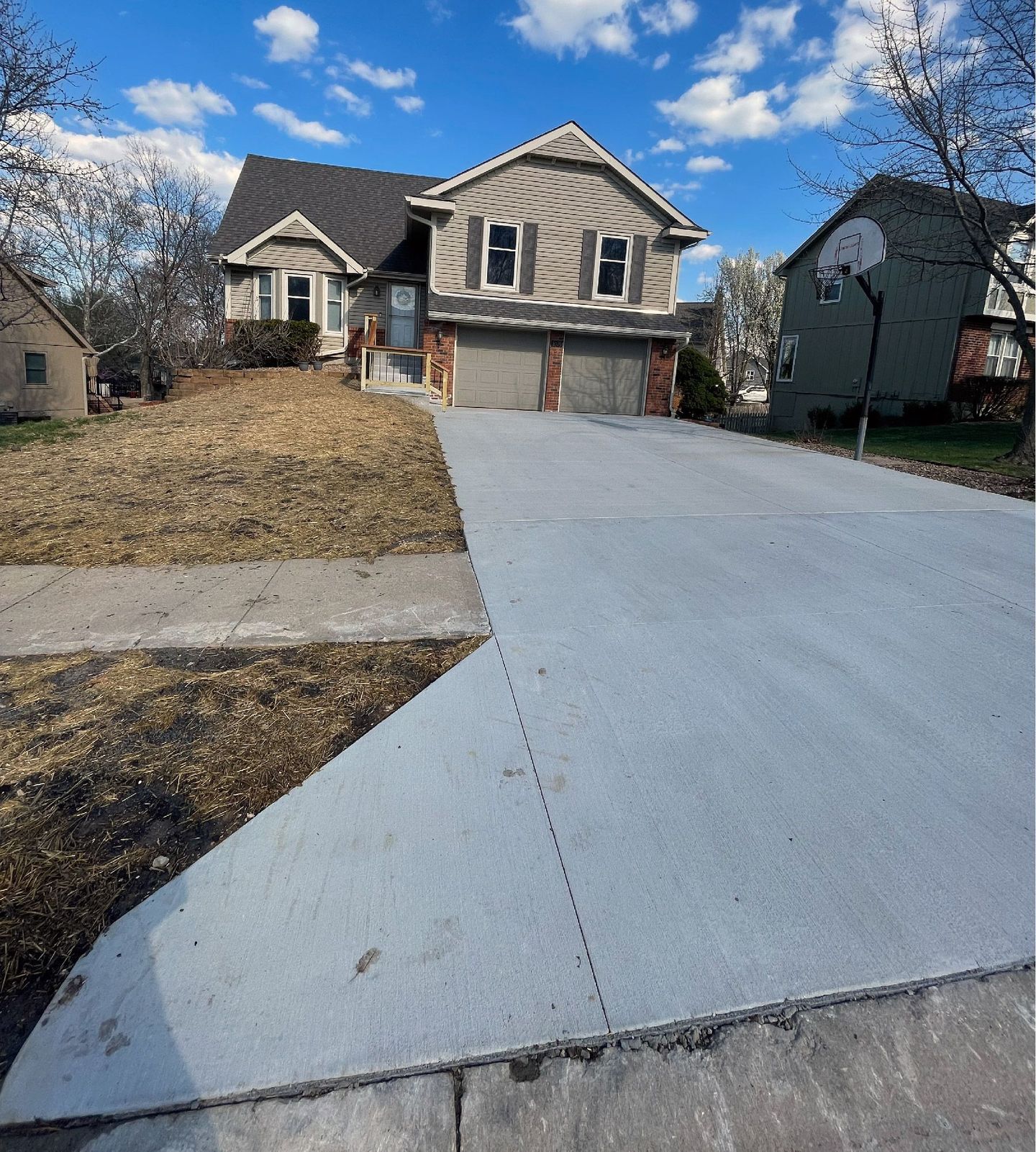 Brand new residential house concrete driveway